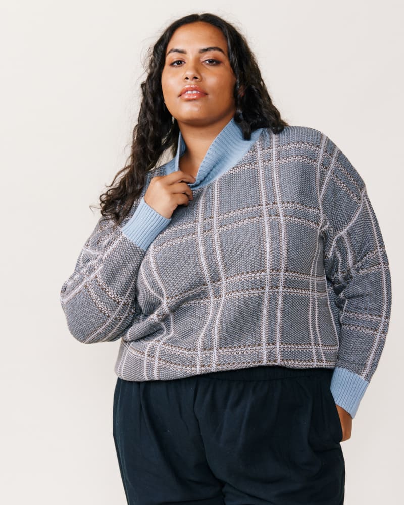 Front of a model wearing a size XXL Jana Patterned Turtleneck Sweater in Plaid by ABLE. | dia_product_style_image_id:271534